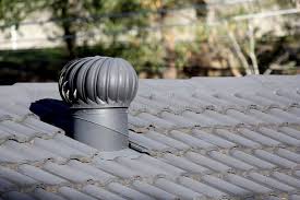 Turbine whirlybird vent installed on a tile roof in Los Angeles